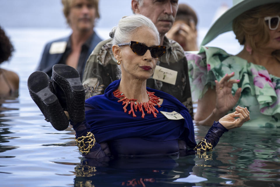 This image released by Lionsgate shows Sonia Braga in a scene from "Shotgun Wedding." (Ana Carballosa/Lionsgate via AP)