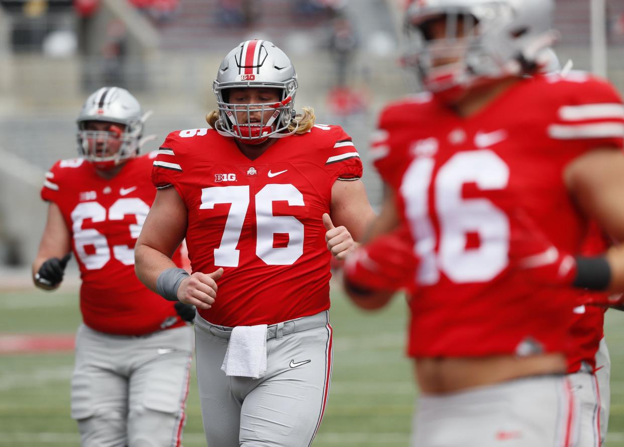 Harry Miller (76) can play both guard and center.