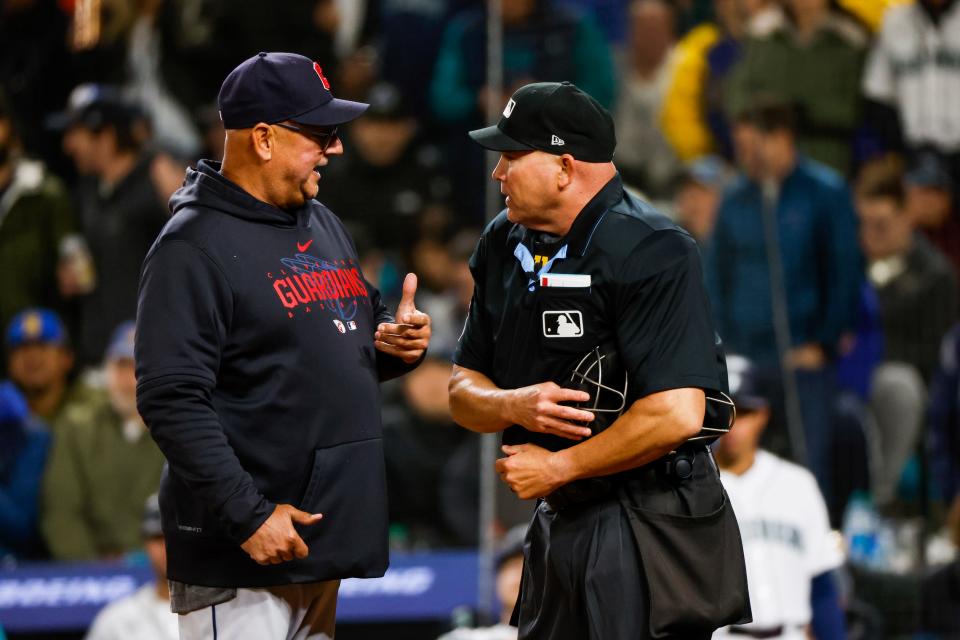 Mar 30, 2023; Seattle, Washington, USA; Cleveland Guardians manager Terry Francona (77) reacts to a call in favor of the Seattle Mariners by home plate umpire Mark Carlson (6) during the eighth inning at T-Mobile Park. Mandatory Credit: Joe Nicholson-USA TODAY Sports