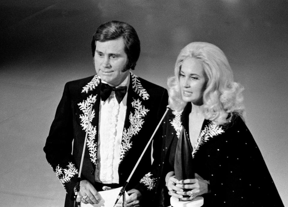 George Jones and Tammy Wynette got divorced, but that didn't stop them from continuing to release hit duets, including 