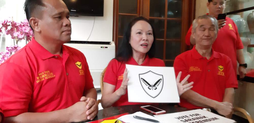 Aspirasi president Lina Soo holding the party's new symbol at a press conference in Kuching, February 22, 2020. ― Picture by Sulok Tawie