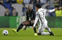 Soccer Football - FC Porto v Juventus - UEFA Champions League Round of 16 First Leg - Dragao Stadium, Porto, Portugal - 22/2/17 FC Porto's Danilo Pereira in action with Juventus' Juan Cuadrado Reuters / Miguel Vidal Livepic