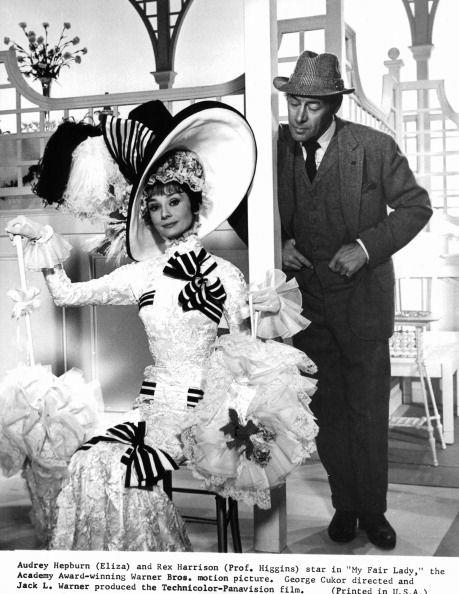 <p>Another Audrey Hepburn–approved and Cecil Beaton–designed outfit that makes our list is Eliza Doolittle's frilly lace ensemble in <em>My Fair Lady</em>. From the high collar to the ribbon accents, we can hardly look at this dress from the musical without bursting out in song.</p>