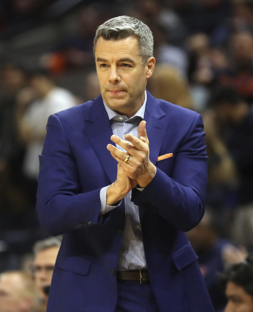 Virginia coach Tony Bennett reacts to a play during the team's NCAA college basketball game against Stony Brook in Charlottesville, Va., Wednesday, Dec. 18, 2019. (AP Photo/Andrew Shurtleff)