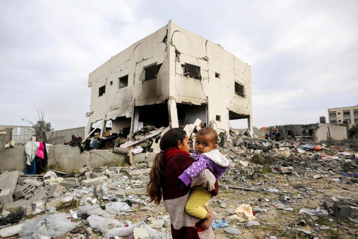 <span>The aftermath of an Israeli strike in Deir al-Balah, Gaza, on Saturday.</span><span>Photograph: Ashraf Amra/Anadolu via Getty Images</span>