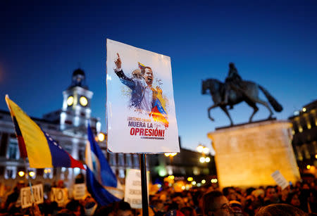 People attend a protest against Venezuela's President Nicolas Maduro's government at Puerta del Sol Square in Madrid, Spain February 2, 2019. REUTERS/Juan Medina