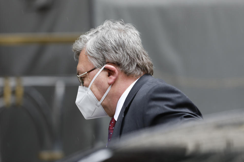 Russia's Governor to the International Atomic Energy Agency (IAEA), Mikhail Ulyanov, enters the 'Grand Hotel Wien' where closed-door nuclear talks with Iran were taking place in Vienna, Austria, Wednesday, May 19, 2021. World powers have held a fourth round of high-level talks aimed at bringing the United States back into a landmark nuclear deal with Iran. Both sides suggested a resolution was possible but major stumbling blocks remain. (AP Photo/Lisa Leutner)