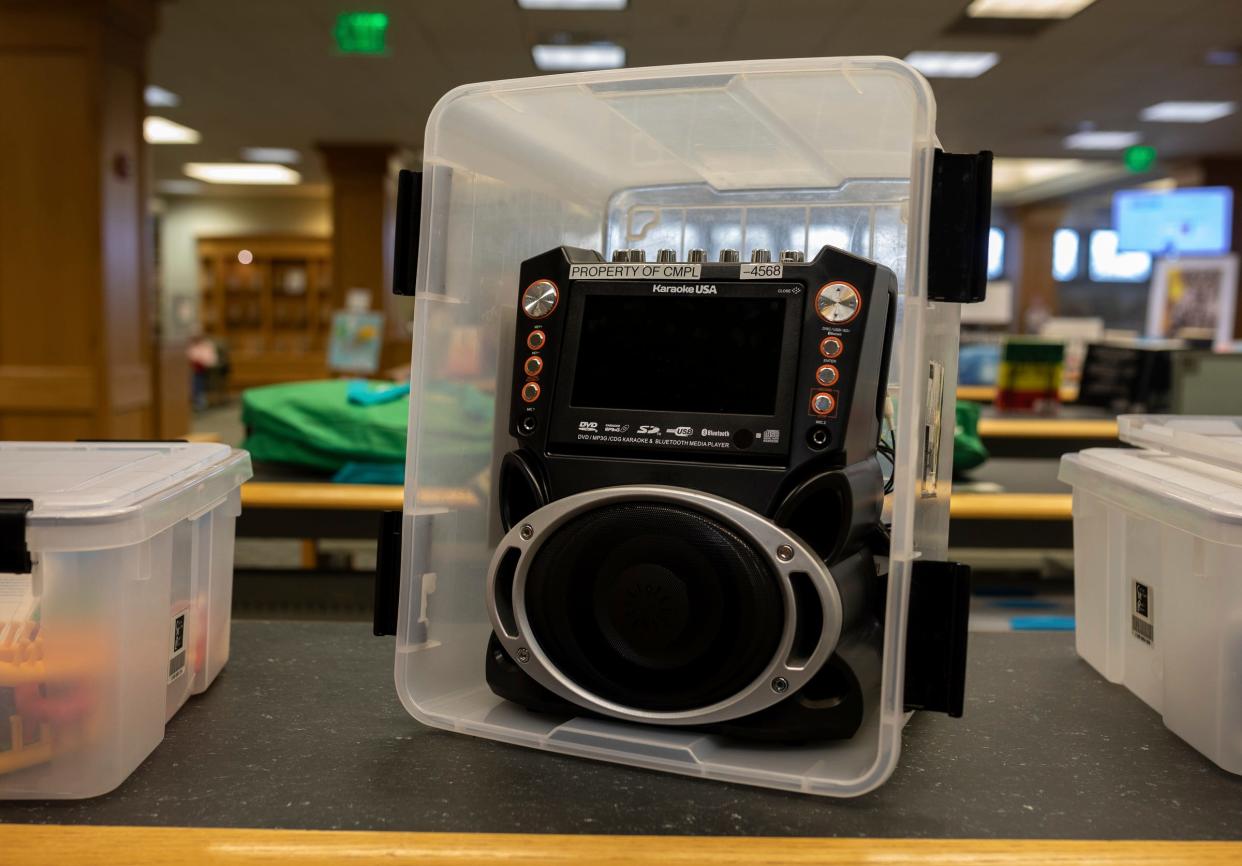 A karaoke machine sits in the Things to Go section inside the Clinton-Macomb Public Library in Clinton Township on Tuesday, Feb. 13, 2024. The karaoke machine is one of the dozens of Things to Go items available at the Clinton-Macomb Public Library.