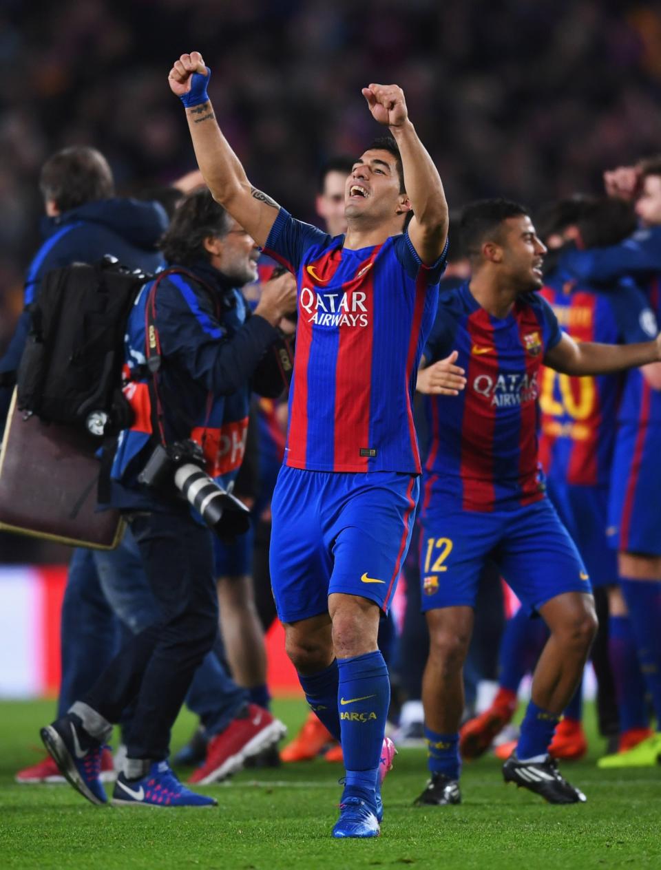 <p>Luis Suarez of Barcelona celebrates victory after the UEFA Champions League Round of 16 second leg match between FC Barcelona and Paris Saint-Germain at Camp Nou on March 8, 2017 in Barcelona, Spain. Barcelona won by 6 goals to one to win 6-5 on aggregate. (Photo by Michael Regan/Getty Images) </p>