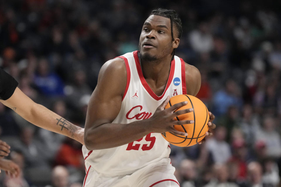 Houston forward Jarace Walker looks to pass during the NCAA tournament. (AP Photo/Rogelio V. Solis)