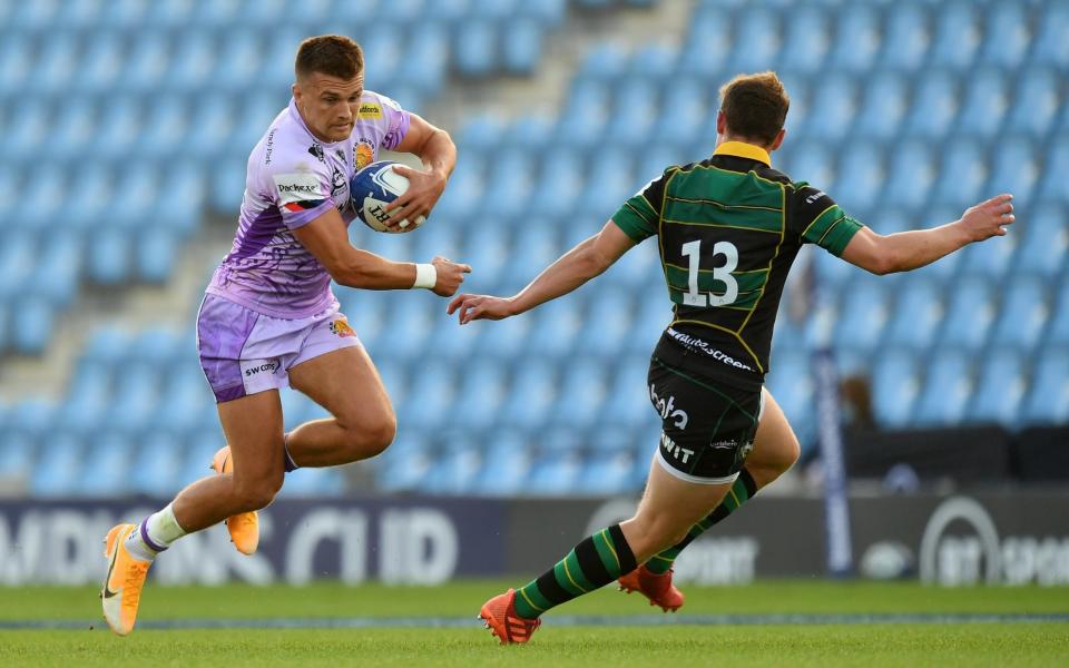 Henry Slade of Exeter Chiefs takes on Fraser Dingwall of Northampton Saints during the Heineken Champions Cup Quarter Final match between Exeter Chiefs and Northampton Saints at Sandy Park on September 20, 2020 in Exeter, England. - GETTY IMAGES