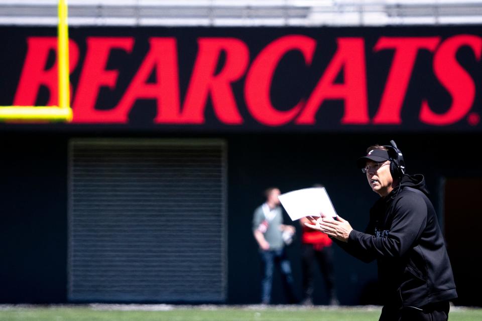 Cincinnati Bearcats head coach Scott Satterfield claps after in the Red and Black Spring Game April 13 at Nippert Stadium.