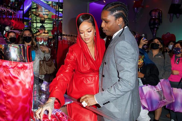 the floor is covered in champagne — Rihanna and A$ap Rocky attend the Louis  Vuitton