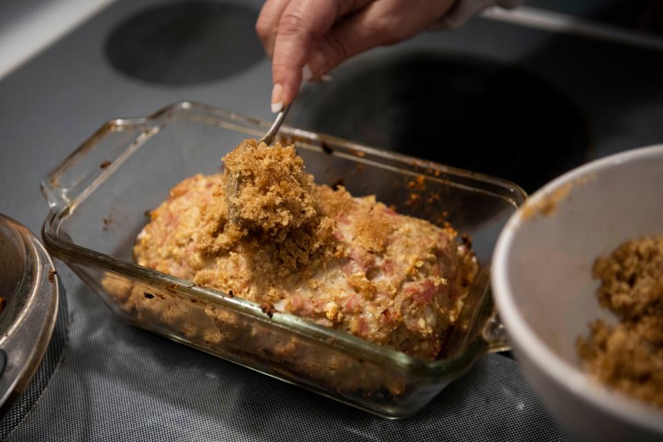 Stacey Rauch prepares her "Ham Loaf" in her kitchen at her home on December 7, 2022 in Lancaster, Ohio.
(Photo: Ty Wright/Eagle Gazette)