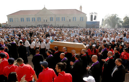 Priests carry the coffin of Cardinal Nasrallah Sfeir, the former patriarch of Lebanon's Maronite church during his funeral in Bkerki, north of Beirut, Lebanon May 16, 2019. REUTERS/Aziz Taher