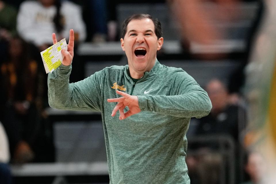 Baylor men's basketball coach Scott Drew gestures to his players from the sideline during the Bears' Jan. 9, 2024, game against BYU in Waco, Texas.