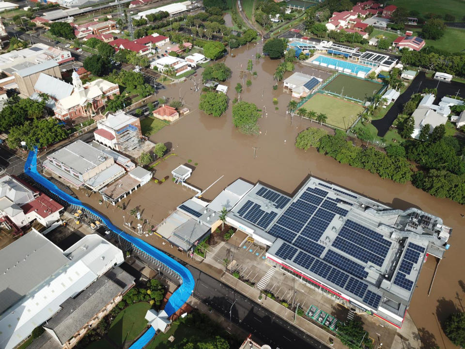 A supplied image obtained on Sunday, January 9, 2022, shows an aerial view of floodwaters impacting the CBD of Maryborough, north of Brisbane, in the wake of former tropical cyclone Seth. Source: AAP