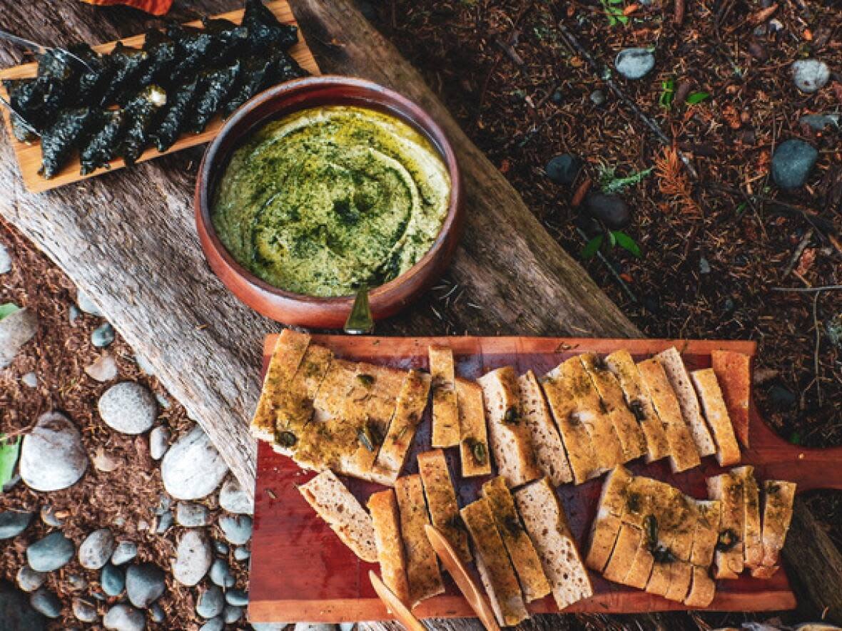 Seaweed can be used to make all kinds of foods, such as dragon kelp dolmas, sea lettuce hummus and sea olives, which can be baked into sourdough focaccia, as seen here.  (Submitted by Tom Kral - image credit)