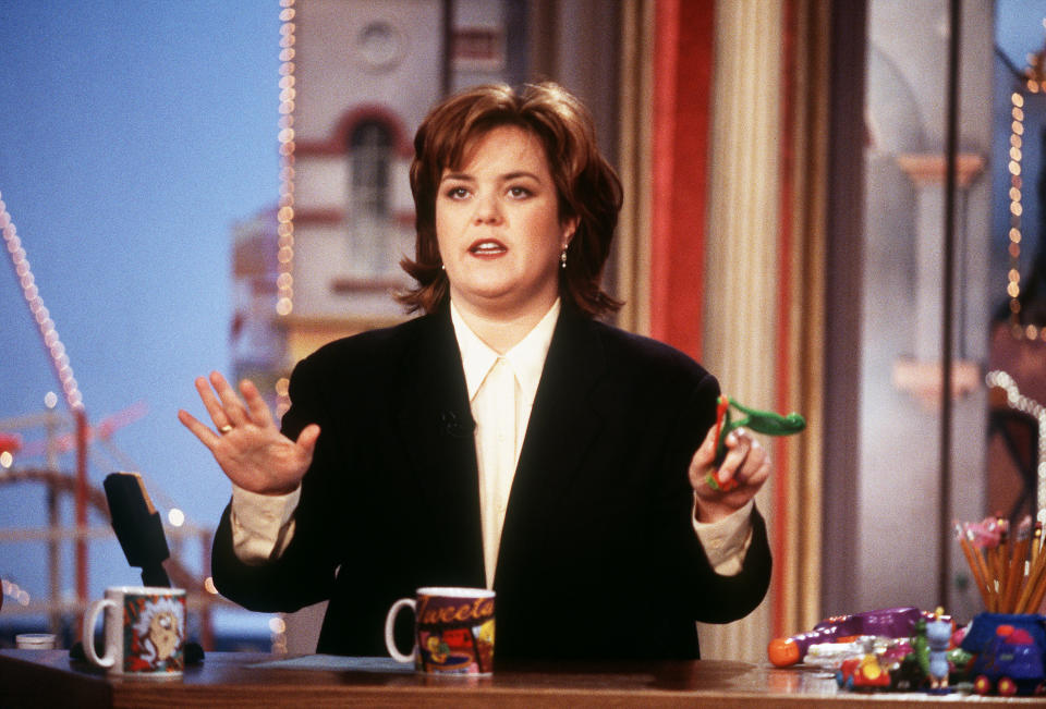 Photo of Rosie O'Donnell at her desk on the show