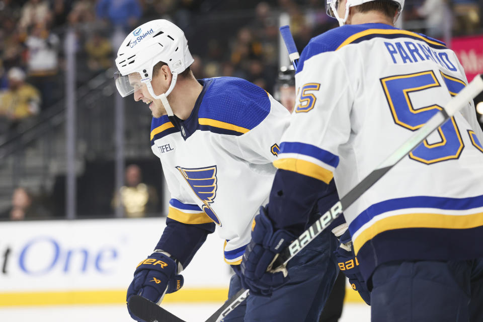 St. Louis Blues right wing Alexey Toropchenko, left, reacts after scoring a goal against the Vegas Golden Knights during the first period of an NHL hockey game Monday, Dec. 4, 2023, in Las Vegas. (AP Photo/Ian Maule)
