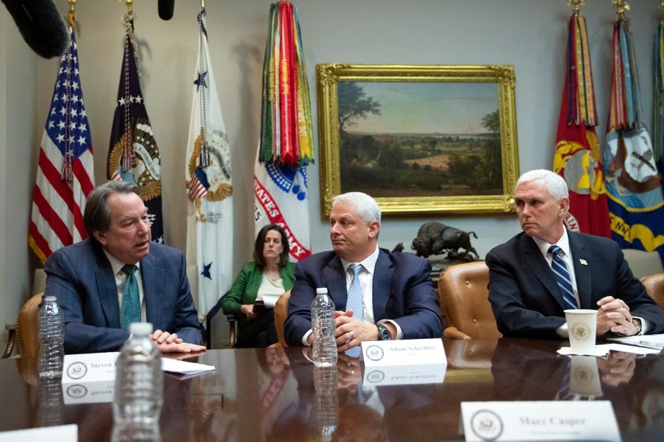 Quest Diagnostics CEO Steven Rutowski, from left, with Lab Corporation CEO Adam Schechter and Vice President Mike Pence, speaks during a coronavirus briefing with Diagnostic Lab CEOs in at the Roosevelt Room of the White House, Wednesday, March 4, 2020, in Washington. (AP Photo/Manuel Balce Ceneta)