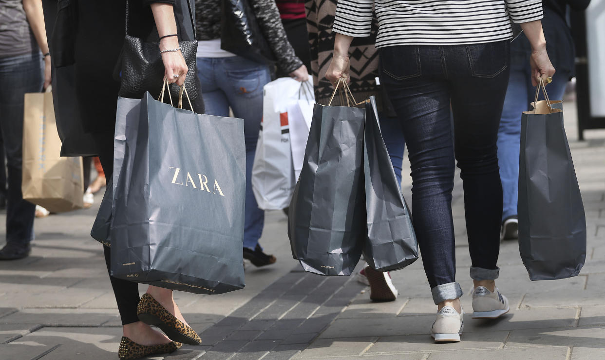 File photo dated 15/09/14 of shoppers, as consumer confidence rose in July, possibly due to the Government's cost of living payments, according to a YouGov survey.