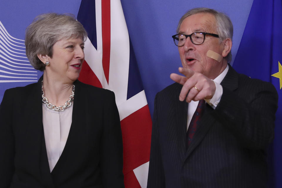 British Prime Minister Theresa May, left, is greeted by European Commission President Jean-Claude Juncker prior to a meeting at EU headquarters in Brussels, Wednesday, Feb. 20, 2019. European Commission President Jean-Claude Juncker and British Prime Minister Theresa May meet Wednesday for their latest negotiating session to seek an elusive breakthrough in Brexit negotiations. (AP Photo/Francisco Seco)