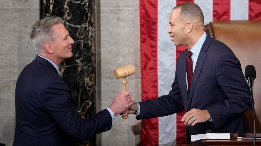 <em>House Speaker Kevin McCarthy (R-Calif.) receives the gavel from House Minority Leader Hakeem Jeffries (D-N.Y.) on Jan. 7 at the U.S. Capitol in Washington. AP Photo/Andrew Harnik</em>