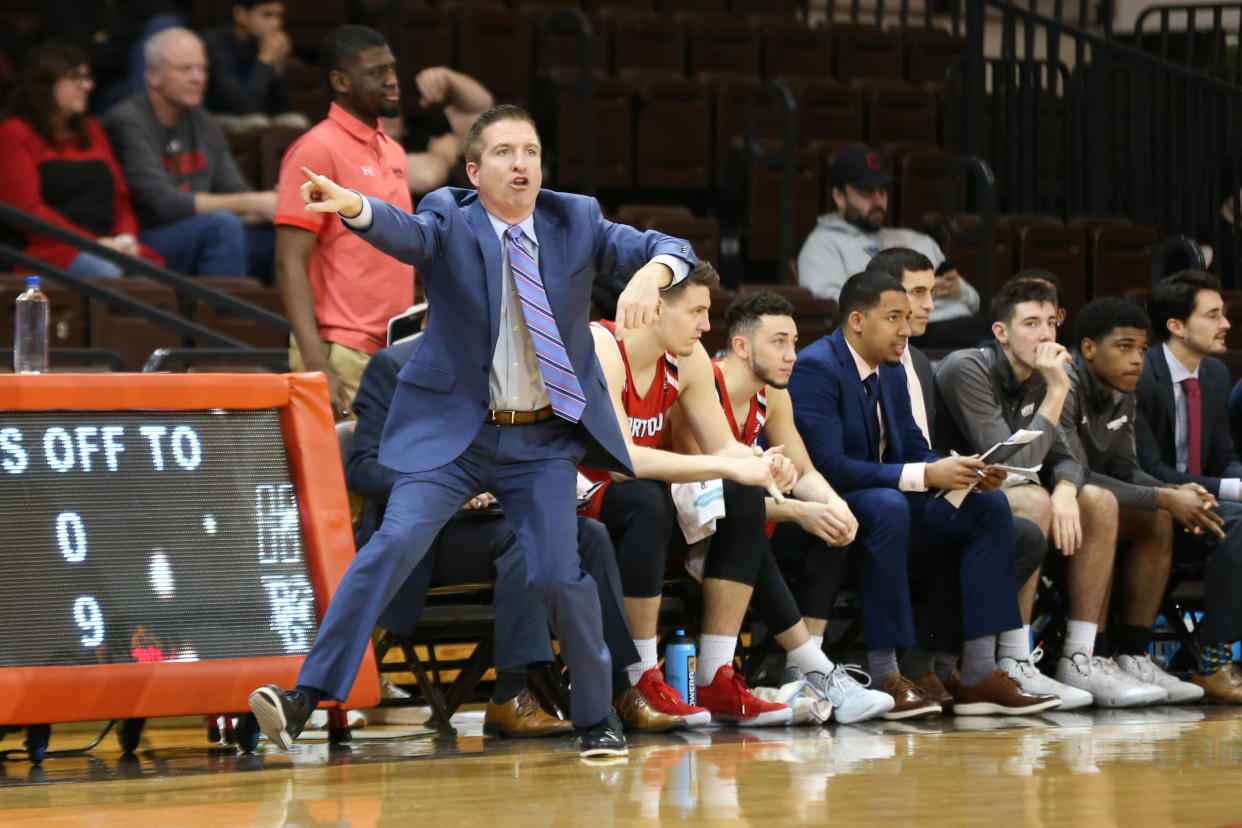 Hartford coach John Gallagher shouts instructions to his players during a game against Bowling Green on Dec. 31, 2019.  (Scott W. Grau/Icon Sportswire via Getty Images)