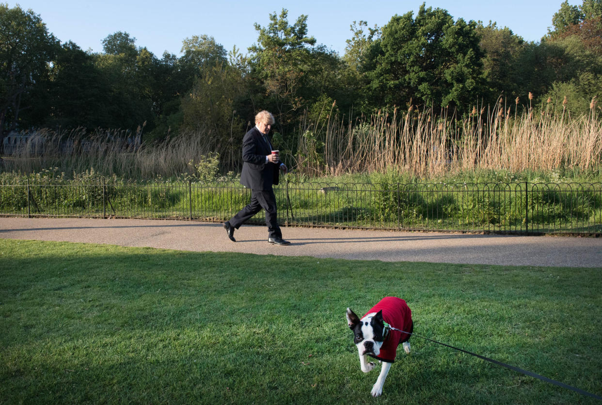 Boris Johnson takes a morning walk in St James' Park on 6 May. (Stefan Rousseau/PA)   