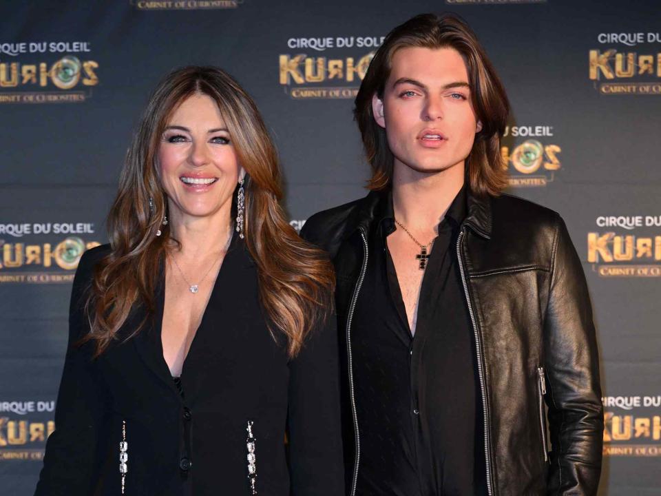 <p>Karwai Tang/WireImage</p> Elizabeth Hurley and her son Damian Hurley attend the European Premiere of Cirque du Soleil