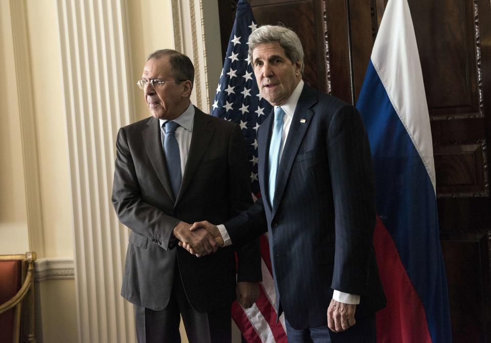 U.S. Secretary of State John Kerry (R) and Russian Foreign Minister Sergei Lavrov shake hands before their meeting at Winfield House, the residence of the U.S. ambassador to the UK, in London on March 14, 2014. The United States and Russia launched a round of 11th-hour diplomacy just two days before Crimea votes to secede from Ukraine in a referendum that has sparked the biggest East-West showdown since the Cold War. (Photo credit should read BRENDAN SMIALOWSKI/AFP/Getty Images)