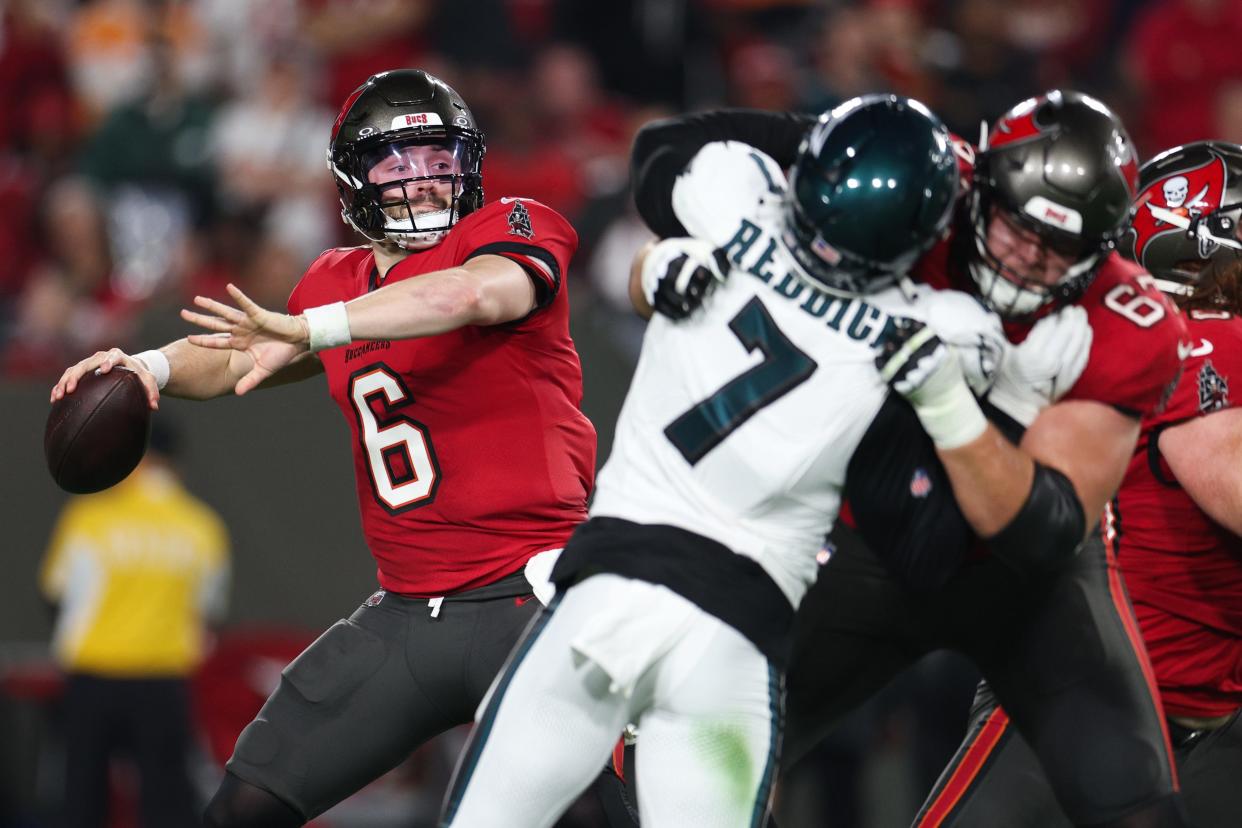 Jan 15, 2024; Tampa, Florida, USA; Tampa Bay Buccaneers quarterback Baker Mayfield (6) throws against the Philadelphia Eagles during the first half of a 2024 NFC wild card game at Raymond James Stadium. Mandatory Credit: Nathan Ray Seebeck-USA TODAY Sports