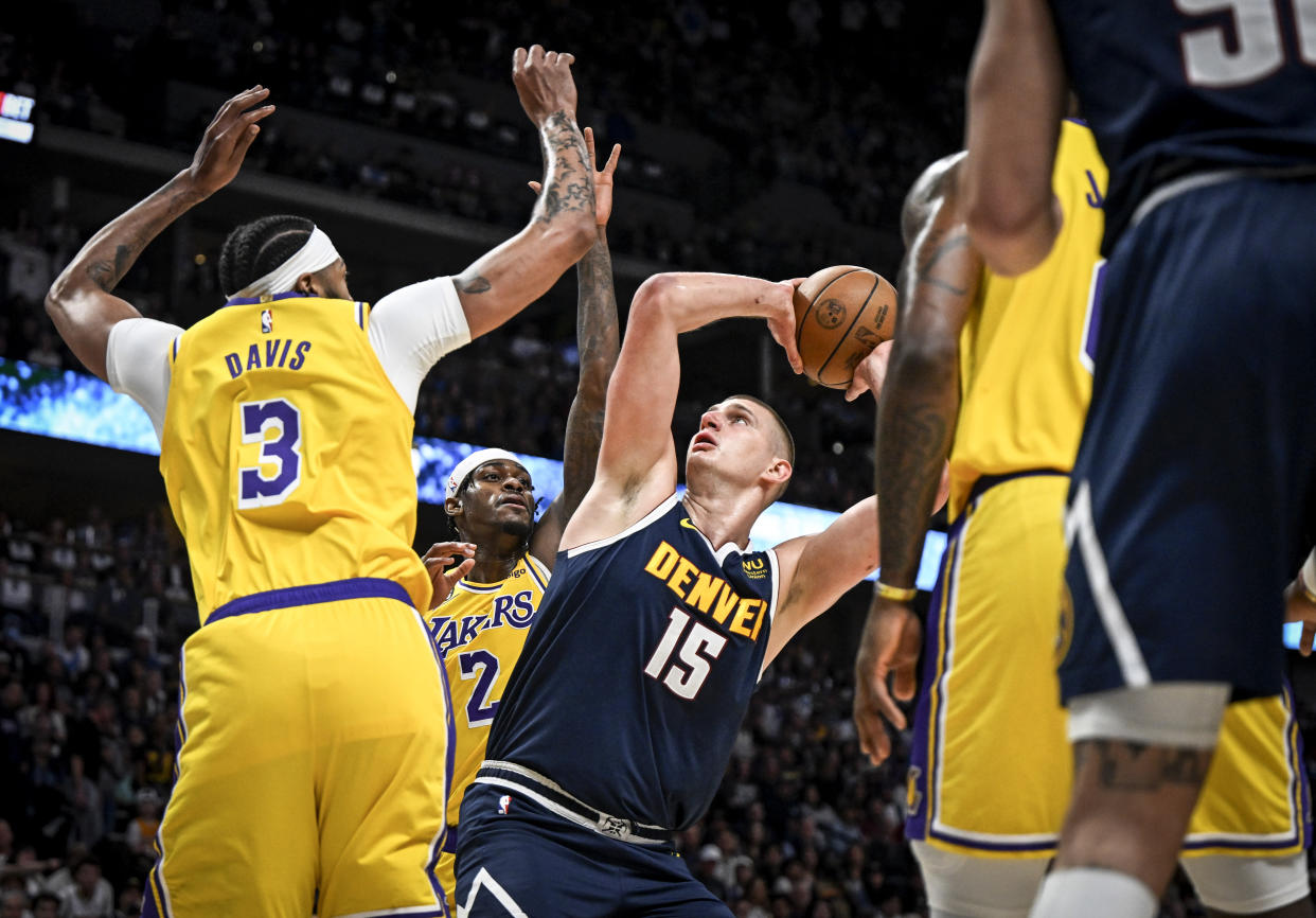 The Denver Nuggets' Nikola Jokić works against the Los Angeles Lakers' Anthony Davis during Game 2 at Ball Arena in Denver on May 18, 2023. (AAron Ontiveroz/The Denver Post)