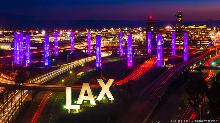 Police Investigating as Four People Fall Ill at LAX Airport -- One person remains in critical condition.