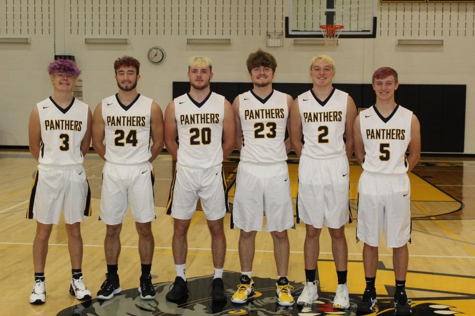 Lena-Winslow's senior basketball players pose for a photo before their Senior Night game against Fulton in Lena on Tuesday, Dec. 6, 2022. They are, from left: Owen Gilbertson; Jake Zeal; Gunar Lobdell; Rowen Schulz; Ayden Packard; and Drew Streckwald. Lobdell hit a half-court, buzzer-beater to win the game.
