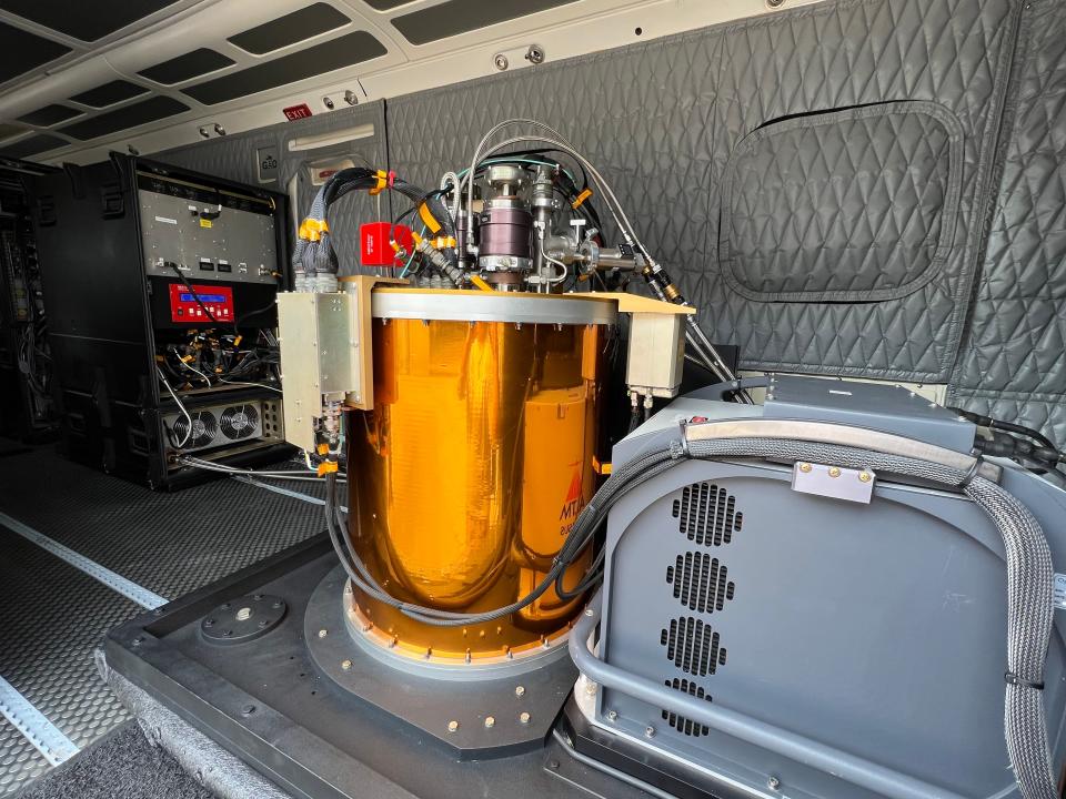 An infrared imaging spectrometer inside an airplane.