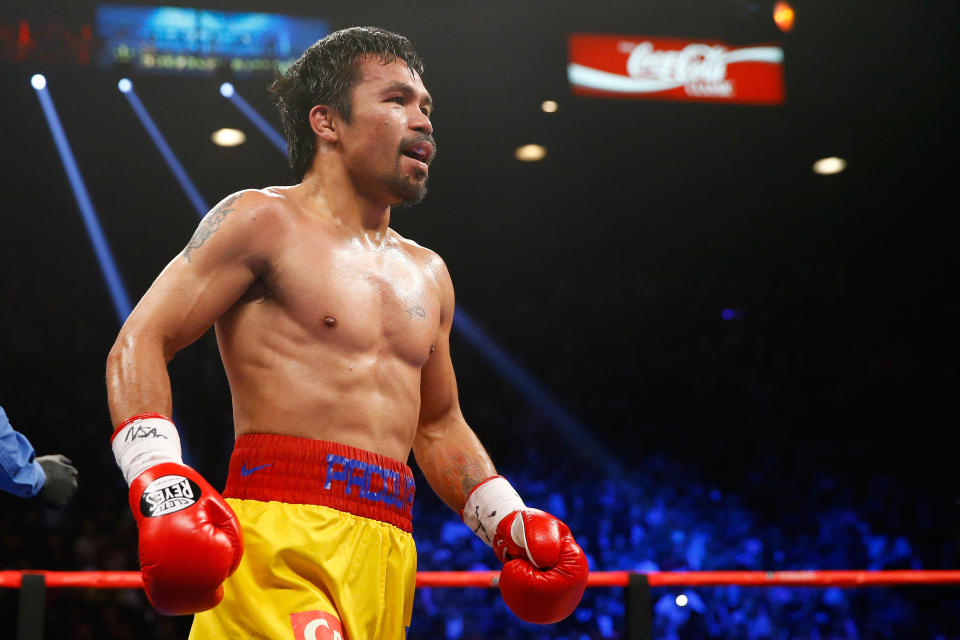 LAS VEGAS, NV - MAY 02:  Manny Pacquiao in the ring between rounds during the welterweight unification championship bout on May 2, 2015 at MGM Grand Garden Arena in Las Vegas, Nevada.  (Photo by Al Bello/Getty Images)