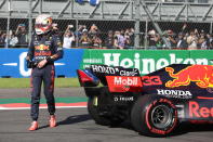 Red Bull driver Max Verstappen, of The Netherlands, walks off his car after coming in third in the qualifying run of the Formula One Mexico Grand Prix auto race at the Hermanos Rodriguez racetrack in Mexico City, Saturday, Nov. 6, 2021. (Edgard Garrido, Pool Photo via AP)