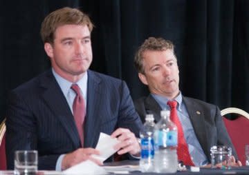 Jack Conway and Ron Paul appear at an event in July.