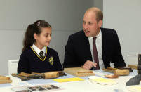 Britain's Prince William joins local school children from St Cuthbert with St Matthias CE Primary School at a copper beating workshop during the official opening of Japan House in London, Britain, September 13, 2018. Tim P. Whitby/Pool via REUTERS