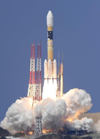 A H-IIA rocket carrying Michibiki 3 satellite, one of four satellites that will augment regional navigational systems, lifts off from the launching pad at Tanegashima Space Center on the southwestern island of Tanegashima, Japan, in this photo taken by Kyodo August 19, 2017. Mandatory credit Kyodo/via REUTERS