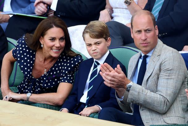PHOTO: The Duke and Duchess of Cambridge talk to their son Prince George as they attend the men's singles final tennis match between Serbia's Novak Djokovic and Australia's Nick Kyrgios at the 2022 Wimbledon Championships in London, July 10, 2022. (Hannah Mckay/Reuters)