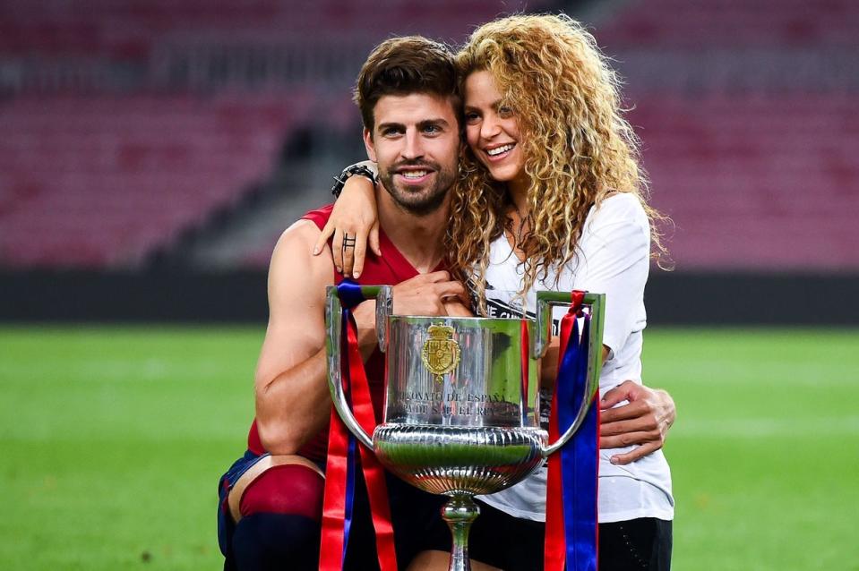 Gerard Pique of FC Barcelona and Shakira pose with the trophy after FC Barcelona won the Copa del Rey Final match against Athletic Club at Camp Nou, Barcelona in 2015 (David Ramos/Getty Images)