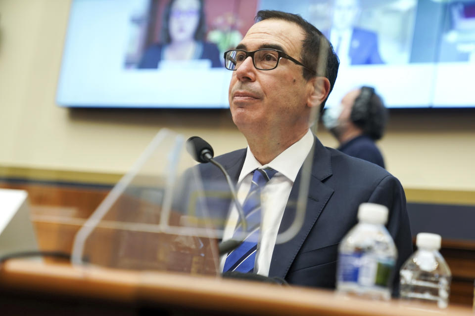 Treasury Secretary Steven Mnuchin listens to a question during a House Financial Services Committee hearing on Capitol Hill in Washington, Wednesday, Dec. 2, 2020. (Greg Nash/Pool via AP)