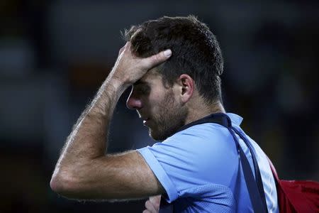 2016 Rio Olympics - Tennis - Final - Men's Singles Gold Medal Match - Olympic Tennis Centre - Rio de Janeiro, Brazil - 14/08/2016. Juan Martin Del Potro (ARG) of Argentina is dejected as he leave the court after losing to Andy Murray (GBR) of Britain. REUTERS/Marcos Brindicci