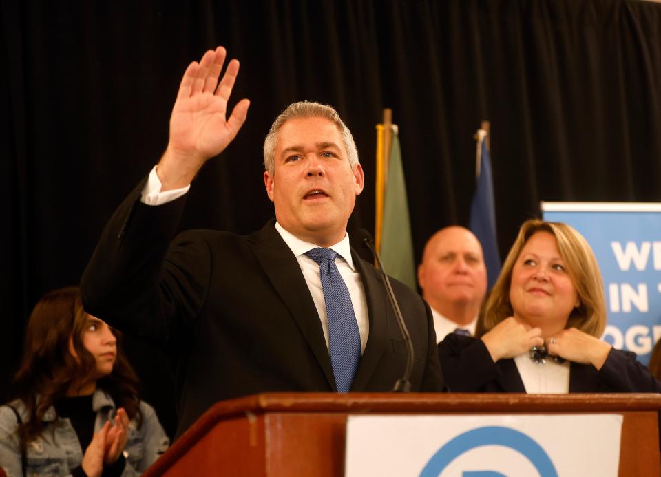 Adam Bello speaks at the Monroe County Democratic Committee party after being reelected to the office of Monroe County Executive.