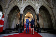 Canada's Prime Minister Justin Trudeau (L) shakes hands with Britain's Prime Minister Theresa May on Parliament Hill in Ottawa, Ontario, Canada, September 18, 2017. REUTERS/Chris Wattie