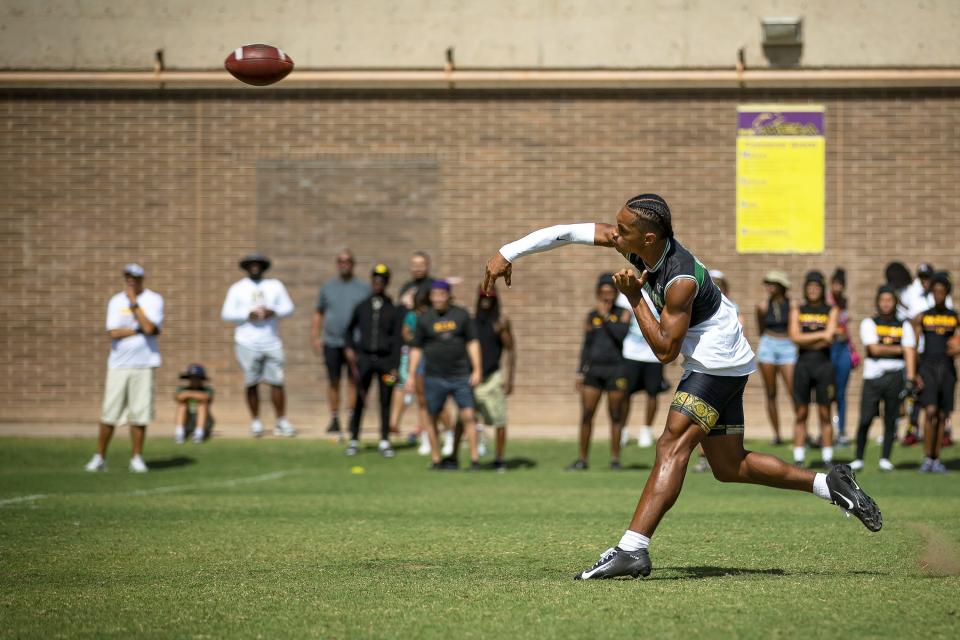 Basha High School's quarterback Demond Williams (9) throws the ball during the Gotta Believe Tournament held at Mesa High School on May 28, 2022.