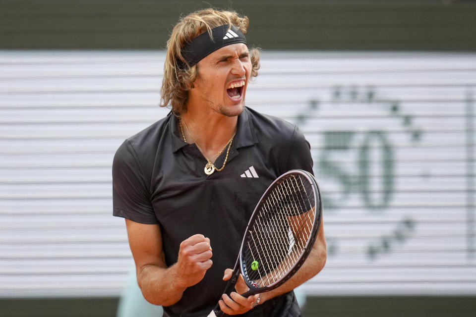 Germany's Alexander Zverev clenches his fist after scoring a point against Argentina's Tomas Martin Etcheverry during their quarterfinal match of the French Open tennis tournament at the Roland Garros stadium in Paris, Wednesday, June 7, 2023. (AP Photo/Christophe Ena)